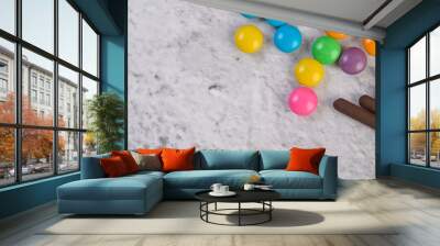 Much multicolored candies placed on a white background. Wall mural