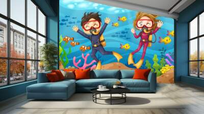 Young man and woman scuba diver dives under the sea Wall mural