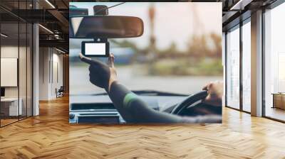 Hand driver or Technician sit on driver seat set up front Car Camera. Blank Screen of car camera mock up while road accident or driving recording real time.People,driving, safety,CCTV car concept Wall mural