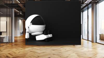 Cute white robot sitting on black background. 3d rendering Wall mural