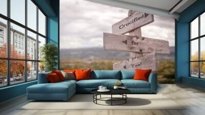 crucified for you text on wooden sign outdoors in nature. Religious and christianity quotes. Wall mural