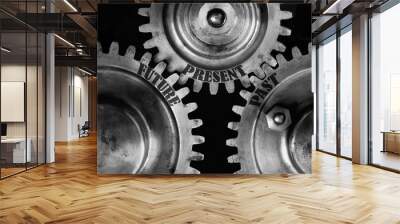 Future, present, past text engraved into wheel cog metal gear with oil spots. Black and white theme. Tomorrow, now and yesterday concept. Wall mural