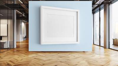 House decoration, empty white frame, poster blank canvas, pictures mock up on a blue wall, living room, template angle view Wall mural