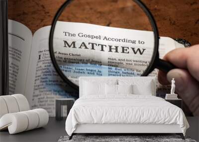 title page book of Matthew close up using magnifying glass in the bible for faith, christian, hebrew, israelite, history, religion, christianity, new testament Wall mural