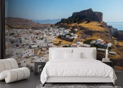 Aerial view of Lindos, Rhodes - a little old white Greek town on the Mediterranean coast to the foothills of the Acropolis if Lindos Wall mural