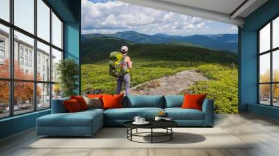 Backpacker Standing on Mountain, Looking Over Maine Forest Landscape Wall mural