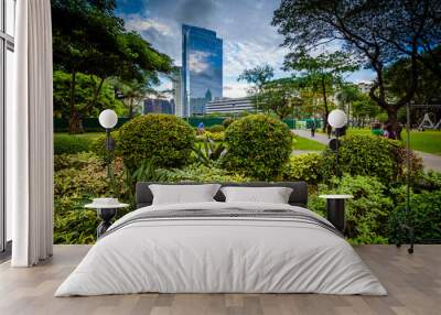 Gardens and skyscrapers seen at Ayala Triangle Park, in Makati, Wall mural