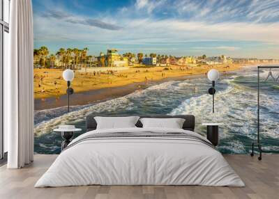 Waves in the Pacific Ocean and view of the beach from the fishin Wall mural