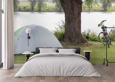 Tent on a camping near river Nederrijn Wall mural