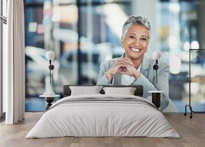 Professional, law and portrait of a woman in business, working with confidence and pride. Smile, happy and mature office employee sitting at a desk to start work in the morning at a legal company Wall mural