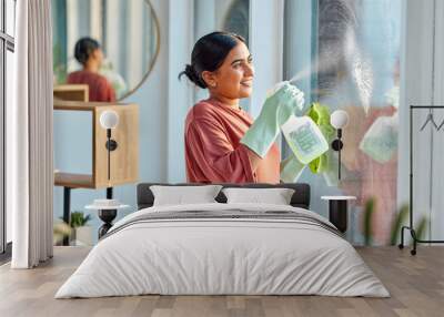 Woman, cleaning and spray product of a cleaner washing a window with a smile in home. Happy working maid use a home hygiene bottle and cloth to disinfect the house furniture with a sanitizer bottle Wall mural