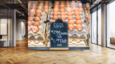 eggs for sale on display for local business stall at farmer's market. fresh brown chicken eggs organ Wall mural