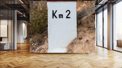 A milestone with second kilometer sign, spain Wall mural