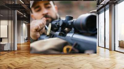 Hunter loading rifle with scope for hunt Wall mural