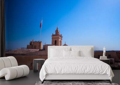 Old landmark castle in Gozo, Malta under a blue sunny sky in summer vacations Wall mural