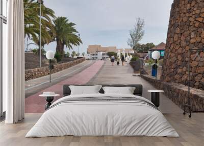 Lanzarote, Spain - December 1, 2020 : Image of the pedestrian promenade in Costa Teguise, Lanzarote island Wall mural