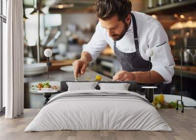 male chef serving food on a white plate working in a restaurant Wall mural