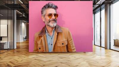 Man With Goatee and Sunglasses in Front of Pink Background Wall mural