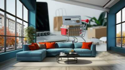 Online payment concept. Small shopping cart Wall mural