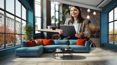 woman with a disability and a tablet Wall mural