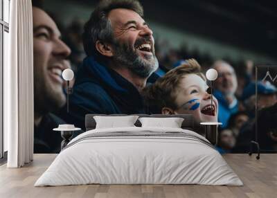 young father with his son enjoying in the cinema Wall mural