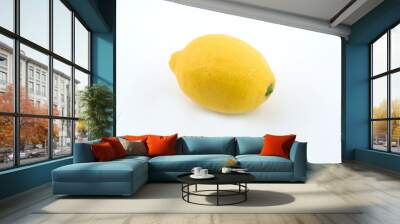 Closeup shot of a fresh lemon isolated on a white background Wall mural