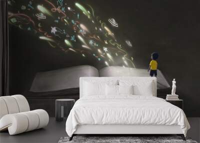 little boy with fantasy book, education concept Wall mural