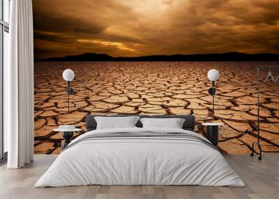 dramatic sunset over cracked earth. Desert landscape background. Wall mural