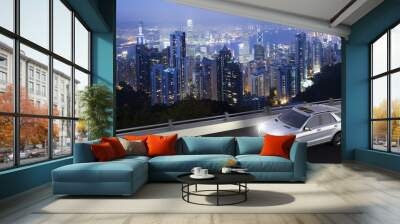 3d rendering of a suv on motion with hong kong skyline on the back Wall mural