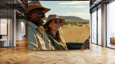 Woman on safari in Africa with a tour guide Wall mural