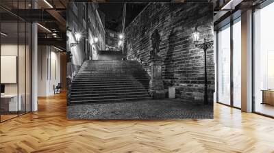 dark stairs with two statues enlightened historical lanterns Wall mural