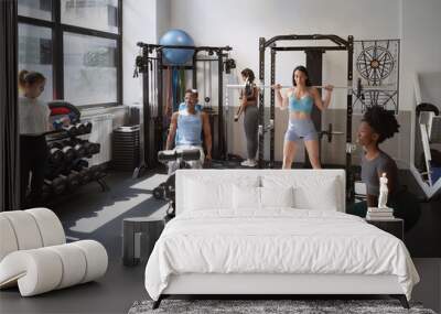 Fitness people training together in the gym. Sports concept. Wall mural