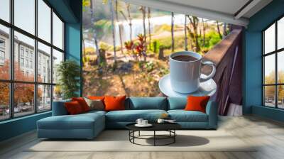 Coffee with a view, at background the turquoise waterfalls at Las Nubes in Chiapas, Mexico Wall mural