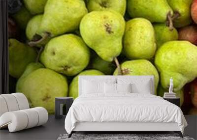 Apples,Plum, peach fruits for sale in the market.A bunch of fresh and ripe fruits are for sale .Fruits stall at fruit market.Fruits backgrounds Wall mural