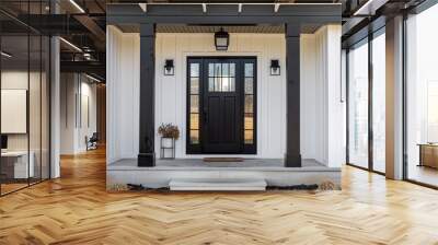 A front door detail of a white modern farmhouse with a black front door and pillars, black light fixtures, and a covered porch. Wall mural