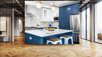 A luxurious white and blue kitchen with gold hardware, stainless steel appliances, and white marbled granite countertops. No brands or labels. Wall mural