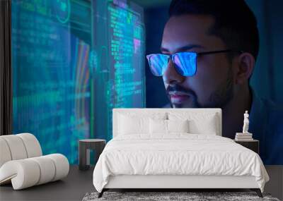 Portrait of Software Developer / Hacker Wearing Glasses Sitting at His Desk and Working on Futuristic Transparent Computer in Digital Identity Cyber Security Data Center. Hacking or Programming Wall mural