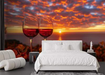 Autumn scene photography of some vineyards with warm colors, in the foreground there are two glasses of wine. Wall mural