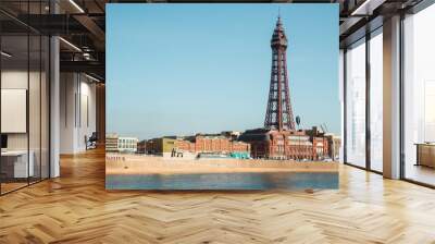 Blackpool, England, 19/09/2019 Beautiful landscape image of the the famous Blackpool Tower on the seaside promenade of the north west, a hotspot for holidays and British tourism. Blue sky and water Wall mural