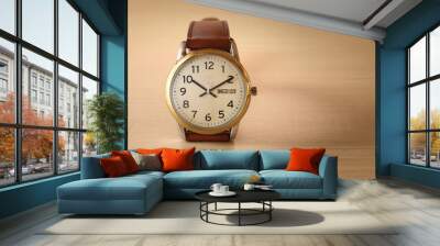 Wristwatch on wooden table Wall mural