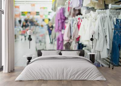 kids fleece jackets and jeans in supermarket Wall mural