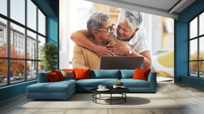 Laptop, senior couple and hug at table in home, bonding and care together on social media. Computer, embrace and elderly man and woman happy, smile and connection to support, love and typing email Wall mural