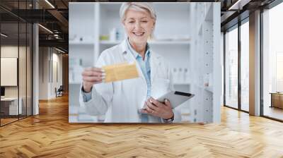 Pharmacy, old woman and tablet with medication, inventory and checking stock with connection, healthcare and research. Senior person, pharmacist and employee with technology, medical and information Wall mural