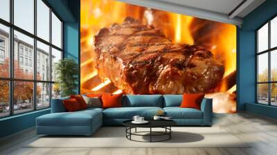 beef steak on the grill with flames. Wall mural