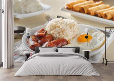 filipino silog breakfast with garlic fried rice, longsilog, and two sunny side up eggs Wall mural