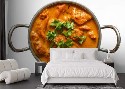 indian butter chicken curry in balti dish top down view and isolated with cilantro garnish Wall mural