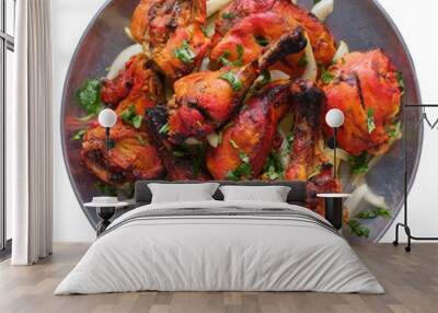 indian tandoori chicken on plate shot from top down view and isolated Wall mural