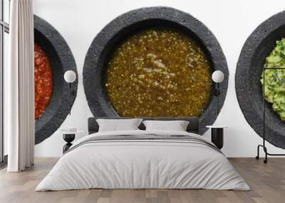 mexican salsas and guacamole in stone molcajetes shot top down and isolated Wall mural