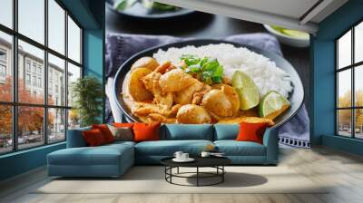 thai massaman curry on plate with jasmine rice and lime wedge Wall mural