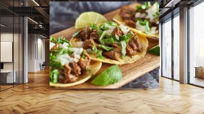 three carne asada mexican street tacos in corn tortilla with lime Wall mural